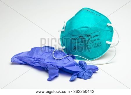 Houston, Tx - April 20, 2020: An Unused Turquoise 3m N95 Protective Respirator Face Mask Next To A B