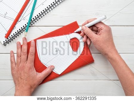 Concept Of Work Or Home Business, Step By Step Instructions For Making A Mask. Female Hand Makes A P