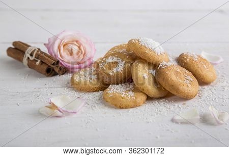 Homemade Coconut Cookies, Light Background And Pink Rose