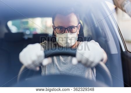 Portrait Of Driver With Face Mask And Medical Gloves, Coronavirus Pandemic Concept.