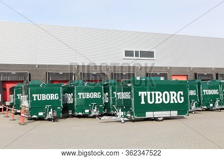 Tilst, Denmark - October 7, 2018: Tuborg Trailers At A Warehouse. Tuborg Is A Danish Brewing Company