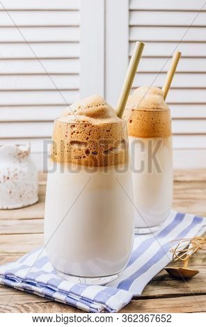 Iced Frothy Dalgona Coffee, A Trendy Fluffy Creamy Whipped Coffee. Korean Drink: Coffee Foam Made Of
