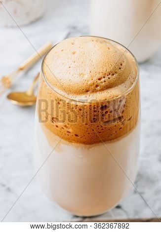 Iced Frothy Dalgona Coffee, A Trendy Fluffy Creamy Whipped Coffee. Korean Drink: Coffee Foam Made Of