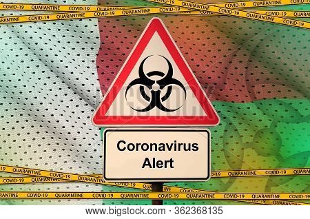 Madagascar Flag And Covid-19 Biohazard Symbol With Quarantine Orange Tape. Coronavirus Or 2019-ncov 