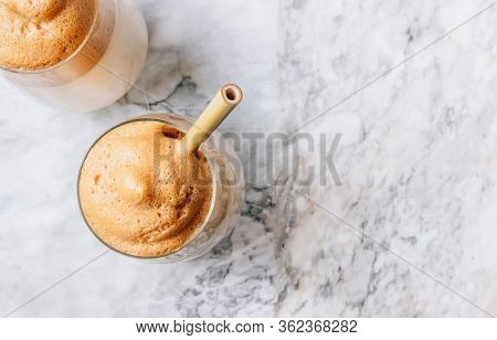 Iced Frothy Dalgona Coffee, A Trendy Fluffy Creamy Whipped Coffee. Korean Drink: Coffee Foam Made Of
