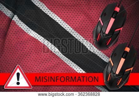 Trinidad And Tobago Flag And Two Computer Mouses. Misinformation During Coronavirus Or 2019-ncov Vir