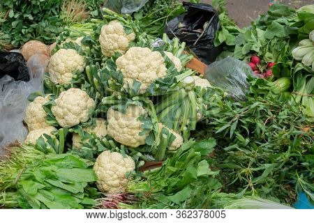 Cauliflowers And Other Vegetables For Sale In A Market In Territy Bazar, Kolkata, West Bengal, India