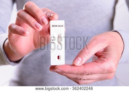 Rapid Covid-19 Coronavirus Strip Test Cassette For Antibody Or Sars-cov-2 Virus Disease In Hands Epi