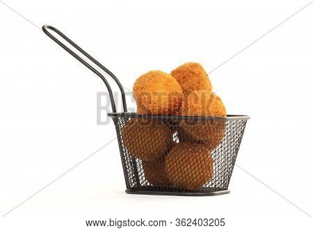 Dutch Traditional Snack Bitterbal In A Small Basket, Isolated