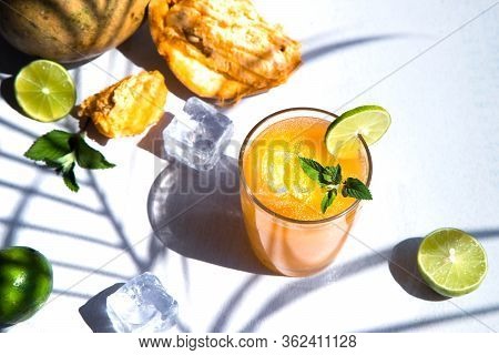 Exotic Fruit Juice From Bel Fruit Or Wooden Apple Called In India Bel Ka Sharbat. Cold Fruit Drink W