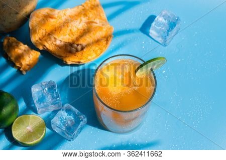 Exotic Fruit Juice From Bel Fruit Or Wooden Apple Called In India Bel Ka Sharbat. Cold Fruit Drink W