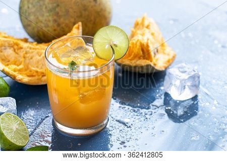Exotic Fruit Juice From Bel Fruit Or Wooden Apple Called In India Bel Ka Sharbat. Cold Fruit Drink W