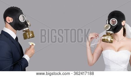 Wedding During The Coronavirus Period. Bride And Groom In Protective Medical Masks