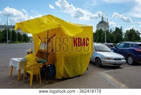 May 23, 2019. Orel, Russia. Sale Of Kvass From A Yellow Metal Barrel On Karl Marx Square In Orel.