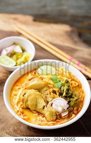 Traditional Northern Thai Food (khao Soi), Spicy Curry Noodles Soup With Coconut Milk And Chicken In