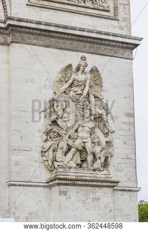 Arc De Triomp With Elements Of Sculptures Designed By Jean Chalgrin In 1806 On Place De Gaulle In Pa