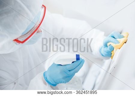 Disinfection Of Switches And Sockets In Public Places. Cleaning Service Against Coronavirus