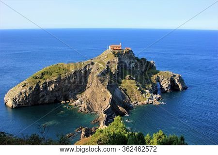 Center Photo Of The Island San Juan De Gaztelugatxe With The Church And Sea From The Viewing Platfor