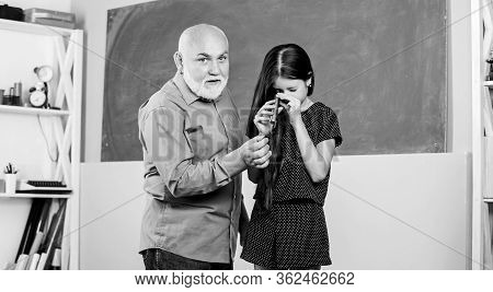 Educative Activity. Little Girl With Man Tutor Study. Biology School Lesson. Pedagogue Friendly Kind