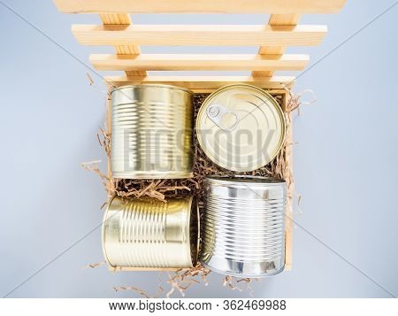 Cans Are Packed In A Wooden Box With A Soft Backing, Isolate On A Gray Background, Close-up, Mockup.
