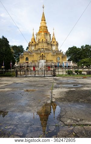 Reflection Of Phra That Chedi Phra Phuttha Dhamma Prakat Stupa And Pagoda In Wat Phutthathiwat Templ