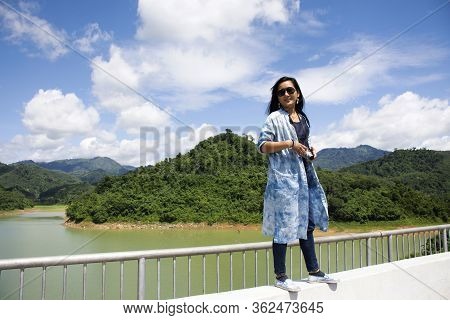 Travelers Thai Women Travel Visit View Of Pattani Dam And Walking On Barrier Concrete On Road Bridge