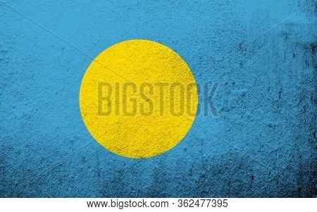 The Republic Of Palau National Flag. Grunge Background
