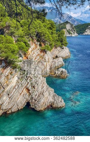 Shoreline And Adriatic Sea Scenic Landscape On The Coast Path To Petrovac.  Location: Petrovac Town,