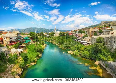 Nerteva River And Old City Of Mostar, With Ottoman Mosque  During Sunny Day. Location: Mostar, Old T