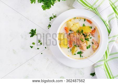 Kalakeitto. Creamy Soup With Salmon, Potatoes, Onions And Carrots And  In A Bowl. Finnish/ Karelian 
