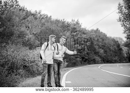 Hitchhiking Gesture. Begin Great Adventure In Your Life With Hitchhiking. Company Friends Travelers 