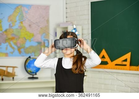 Virtual Classes. Science Class. Vr Technology. Schoolgirl Using Virtual Reality Helmet. Virtual Real