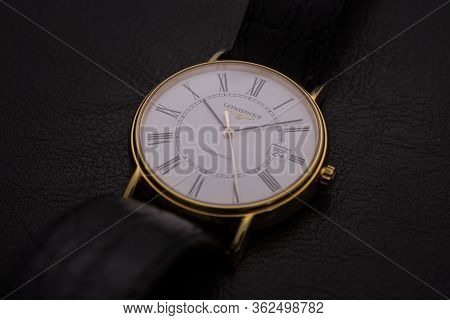 Saint-imier, Switzerland 31.03.2020 - Closeup Image Of Longines Watch Lying On A Black Leather Backg