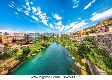 Nerteva River And Old City Of Mostar, With Ottoman Mosque  During Sunny Day. Location: Mostar, Old T