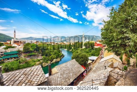 Nerteva River And Old City Of Mostar, With Ottoman Mosque  During Sunny Day. Location: Mostar, Old T