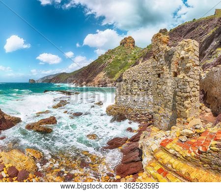 Fantastic Spring View Of Ancient Ruins Of Laveria Lamarmora (miniera Di Nebida) And Nebida Coast. St