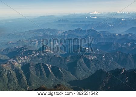 An Aerial View Of Washington State With Mt Rainier Off In The Distance.