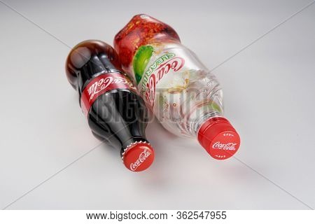 kuala lumpur, malaysia April 21, 2020 .Coca-Cola Classic and coca cola clear  bottle Isolated on white Background. Coca Cola is the most popular carbonated soft drink beverages sold around the world