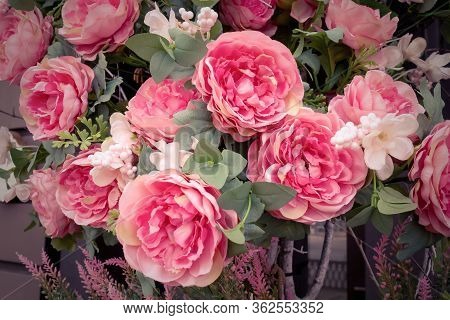 Pink Artificial Peonies Flowers On The Wall. Floral Texture Background For Wedding Scene, Holiday, D