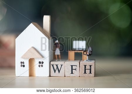 Miniature People Work Stand On Wood Block Of Wfh. Concept Image Wfh (work From Home). During The Cor