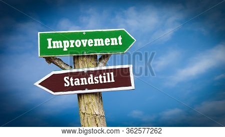 Street Sign The Direction Way To Improvement Versus Standstill