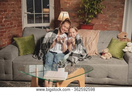 Tea Drinking, Talking. Mother And Daughter During Self-insulation At Home While Quarantined, Family 