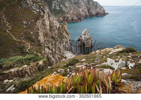 Rock Cliffs By The Sea At Beach Lourical On Cabo Da Roca, Sintra, Portugal