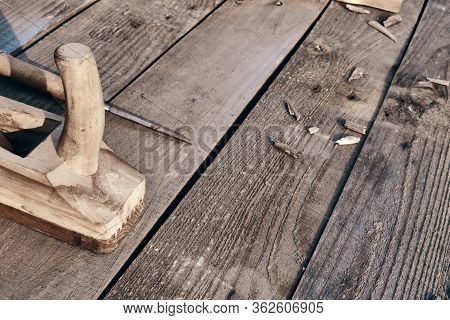 Wooden Background. Jointer Plane And Chisel With Sawdust Lie On The Village Table And There Is Free 