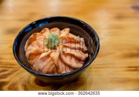 Salmon Sushi Don. Salmon Sashimi, Salmon\'s Egg (ikura), Shredded Radish And Slice Ginger With Rice.