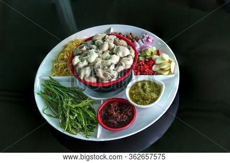 Oysters Food And Chili Sauce, Thai Food Is Oysters With Herbs Or Oyster Spicy Salad. Oysters With Ch