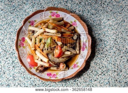 Thai Papaya Salad With Lotus Leaf. Papaya Salad Or What We Called In Thai Som Tum With Lotus Stem Is