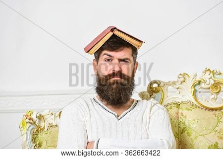 Macho Sits With Open Book On Head, Like Roof. Overwork Concept. Guy, Teacher Overdid With Teaching, 