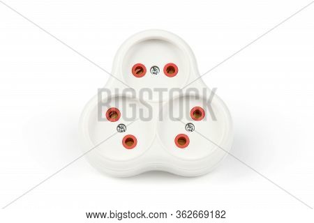 Plastic Electrical Tee Connector With Three Sockets On A White Background. High Resolution Photo. Fu