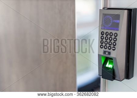 Finger Scan On Machine Security Concept And Safety. Soft Focus On Hand Scanning Finger On Machine Co